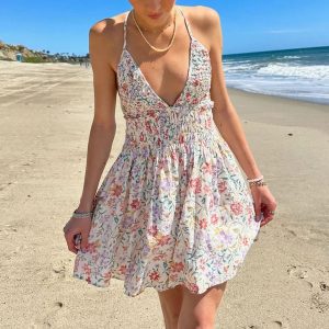 c3c5a39a451f01a7b1ce7e4527b4844fb0438bd9e1a42f7673133812fe438329.jpg Seaside Floral Strap Mini Dress